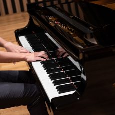 A student plays the piano at Chetham's School of Music